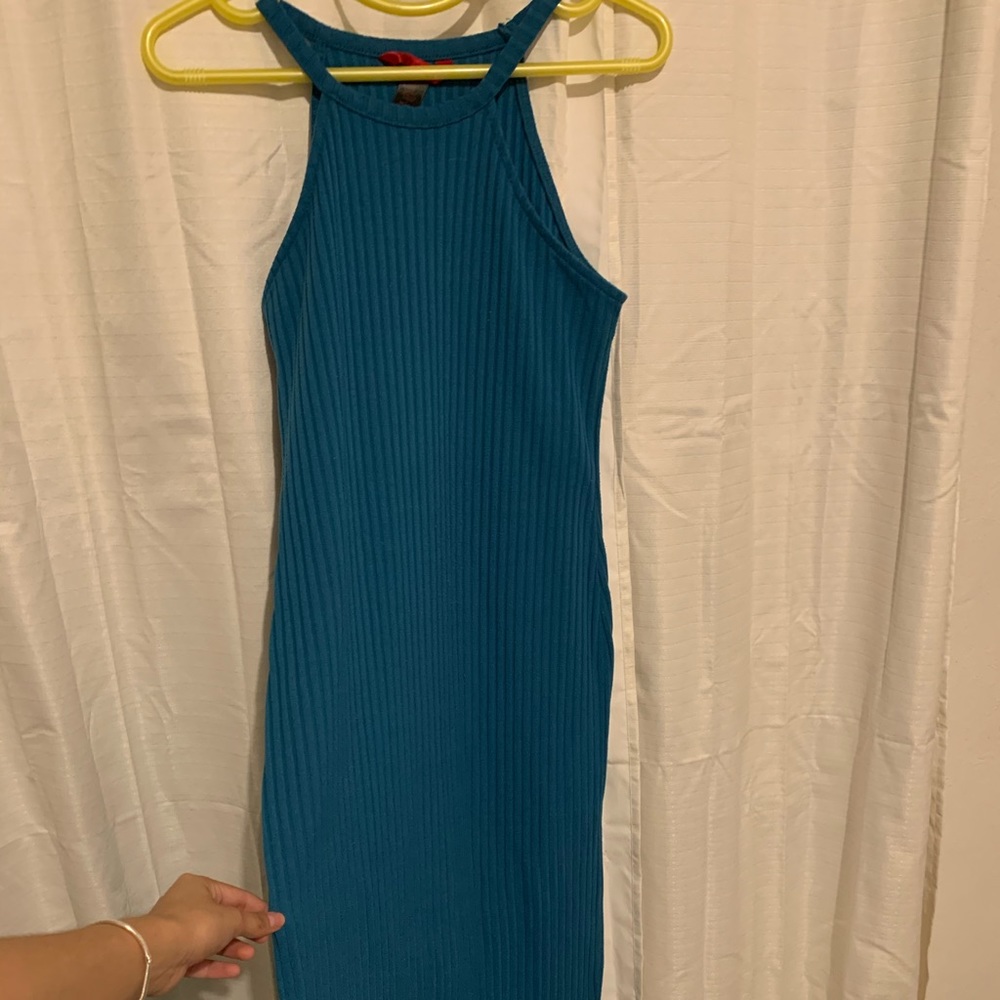 Tight ribbed, long dress with slits on the ends